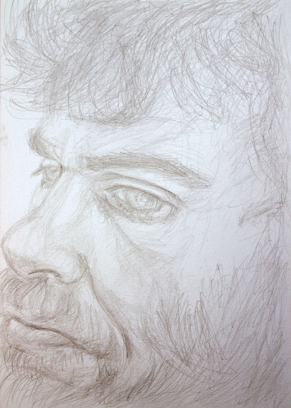 Pencil drawing representing the close up portrait of a young man