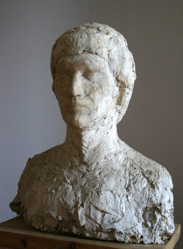Sculpture of the bust of a man in big size made of plaster