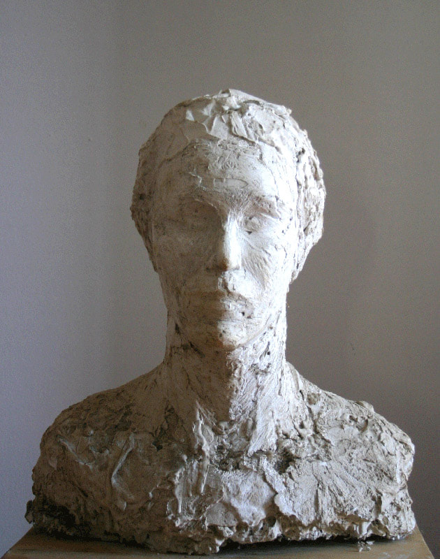 Sculpture of the bust of a woman in big size made of plaster